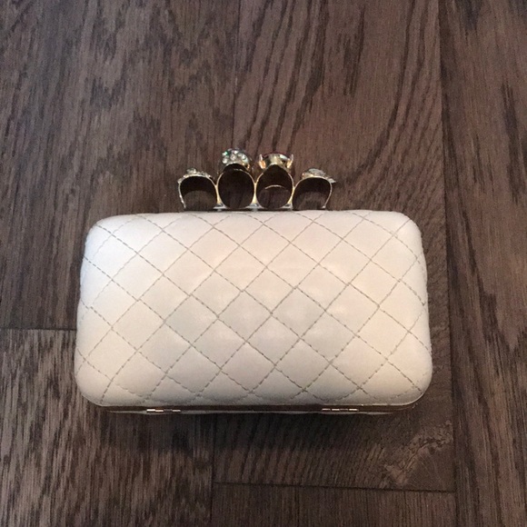 knuckle clutch bag